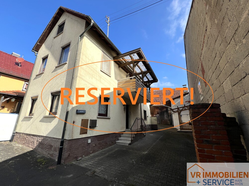 Einfamilienwohnhaus mit Nebengebäuden und Scheune im Ortskern von 97702 Seubrigshausen!