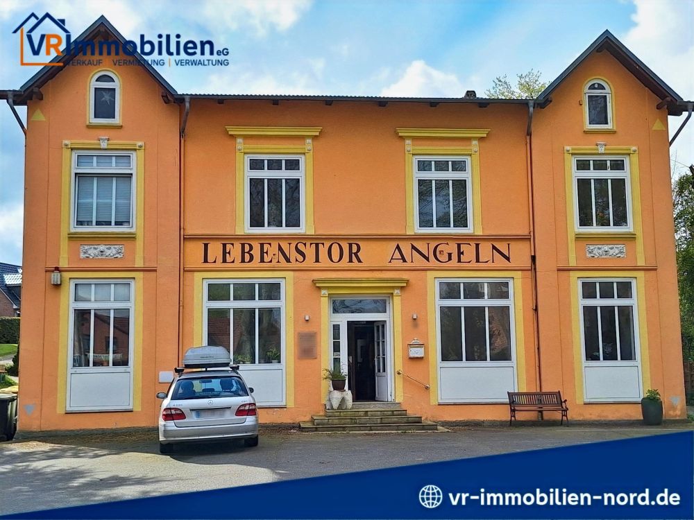 Mehrfamilienhaus mit Gewerbefläche