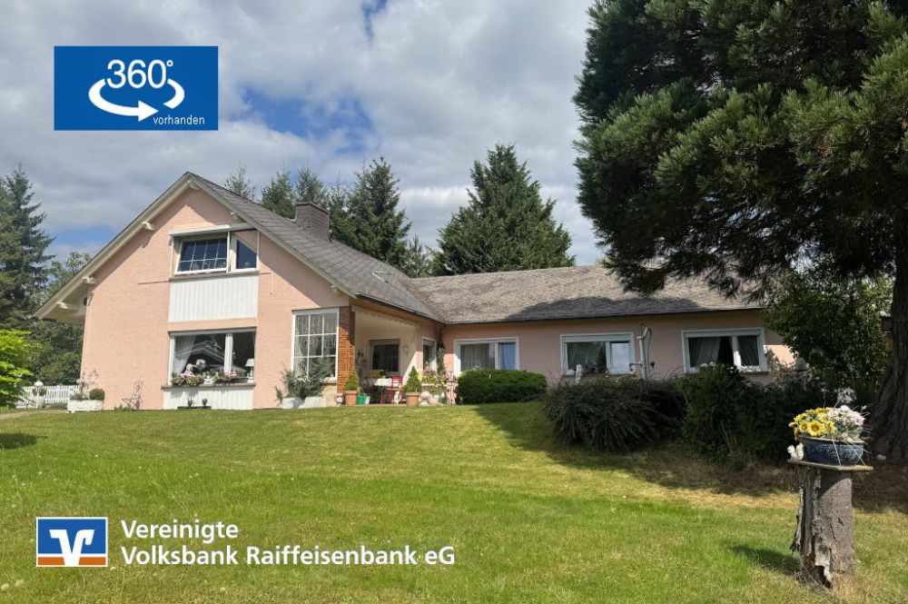 Charmantes Wohnhaus auf parkähnlichem Grundstück