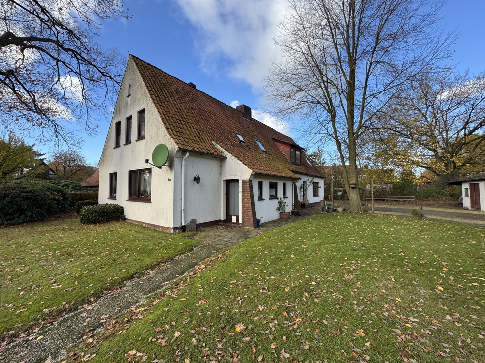 Seltene Gelegenheit im Ortskern von Fischerhude – Doppelhaus auf großem Grundstück