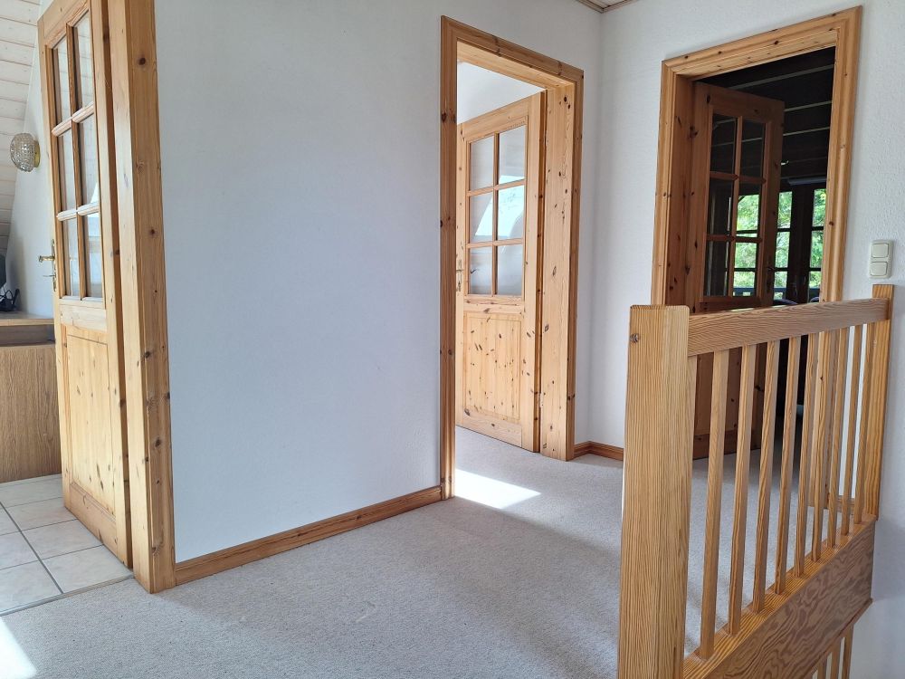 Zauberhaftes Holzbohlenhaus mit Einliegerwohnung in Mohrkirch