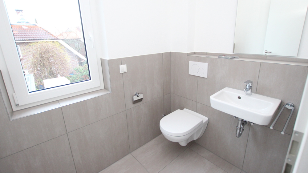 Stilvolle 3-Zimmer-Neubau-Wohnung im OG mit Wintergarten in zentraler Lage von Varel nahe Dangast