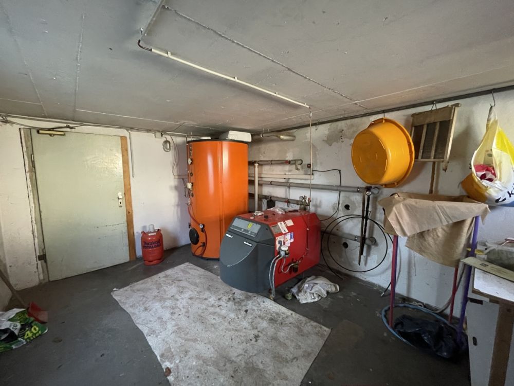 Doppelhaushälfte mit großer Scheune und Garten