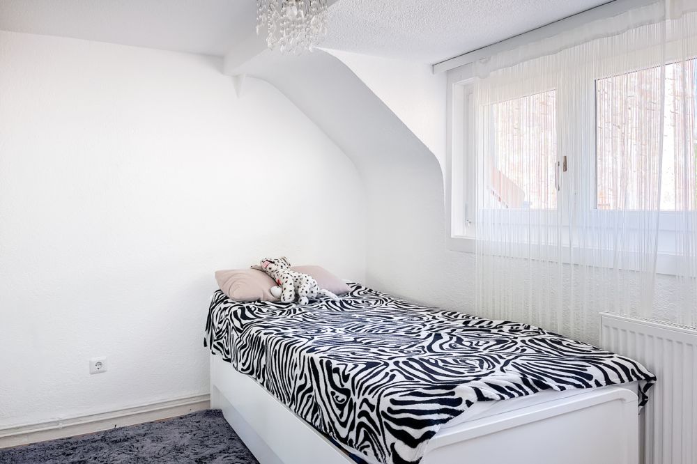 Komfortables Wohnen auf drei Ebenen – Reihenhaus mit Terrasse und Stellplatz