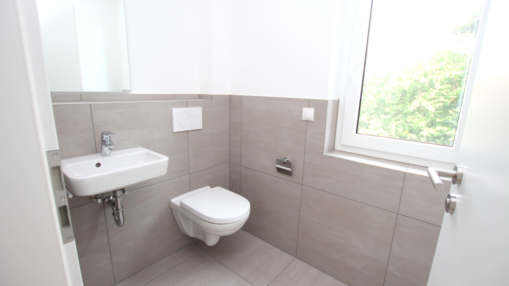 Stilvolle 3-Zimmer-Neubau-Wohnung im OG mit Wintergarten in zentraler Lage von Varel nahe Dangast