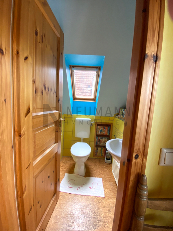 Mehrfamilienhaus mit Gewerbeeinheit (teilvermietet) und großem Garten