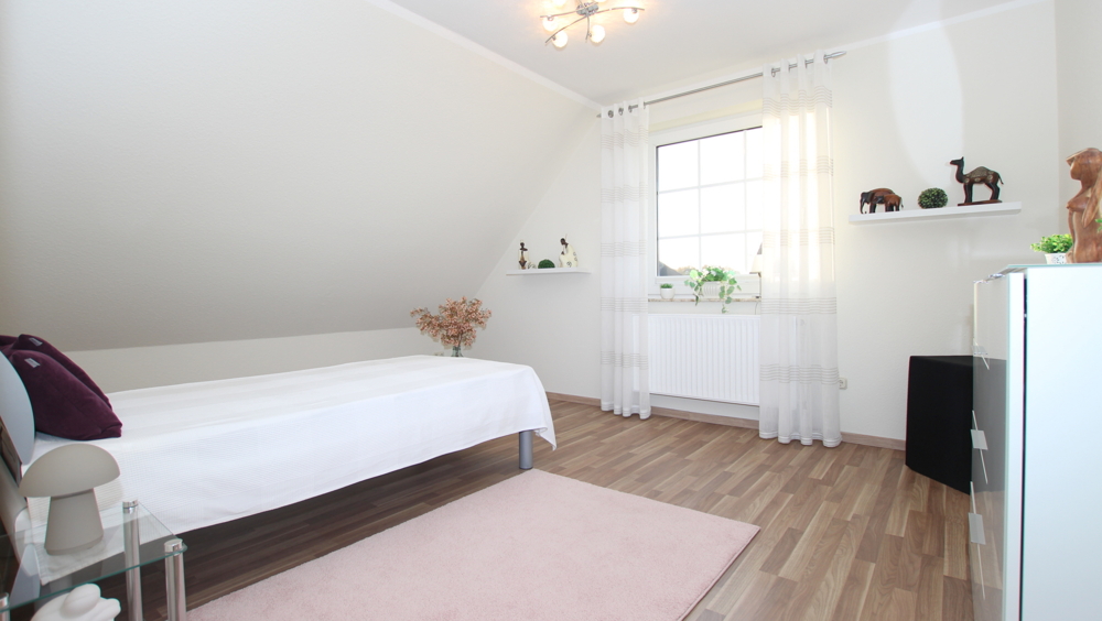 Attraktives EFH mit Wintergarten, Nebengebäude und großzügigem Garten in zentraler Lage von Edewecht