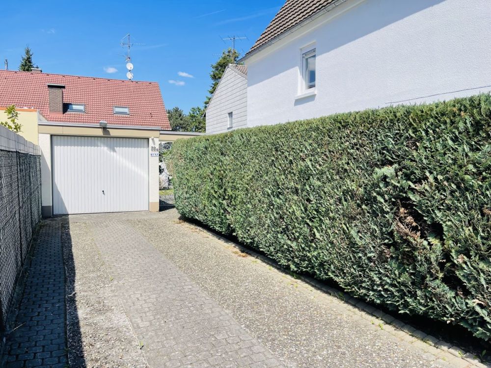 Gartenparadies - Zweifamilienhaus mit Einliegerwohnung