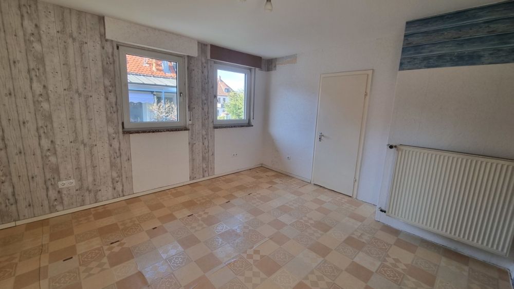 Gutes Mehrfamilienhaus in Rüsselsheim: Attraktive Investitionsmöglichkeit mit Mietpotenzial