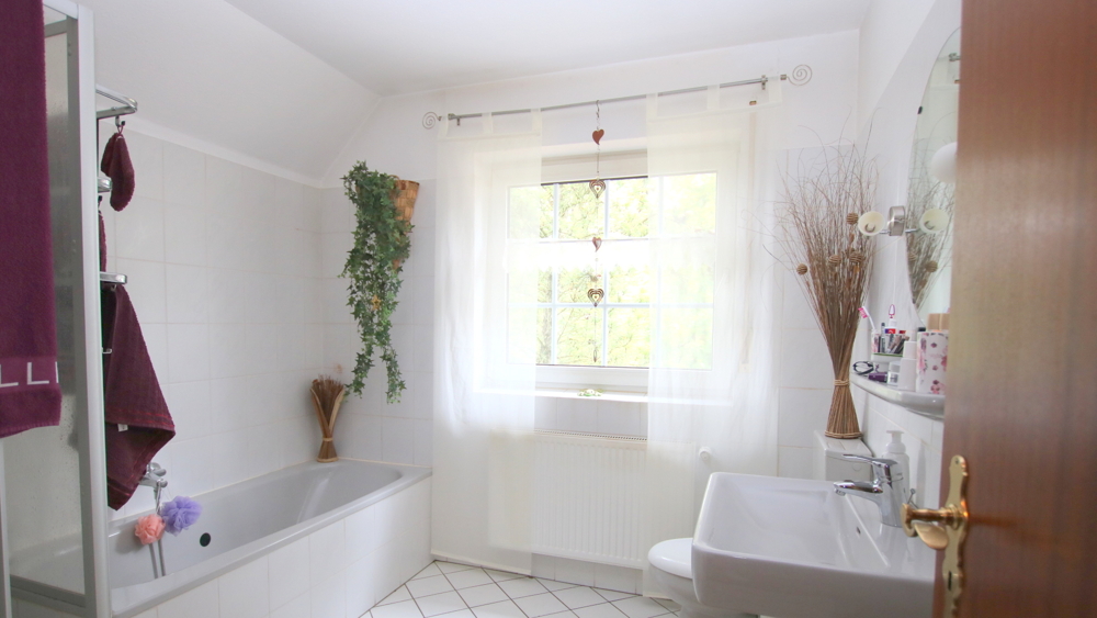 Kapitalanlage! Reihenendhaus m. Garage, Terrasse u. sonnigem Garten in Edewecht / ruh., zentr. Lage