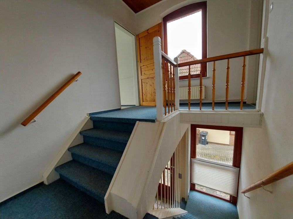 Ein Zuhause mit Potenzial – gemütliche Doppelhaushälfte mit Wintergarten, Carport und Gewächshaus