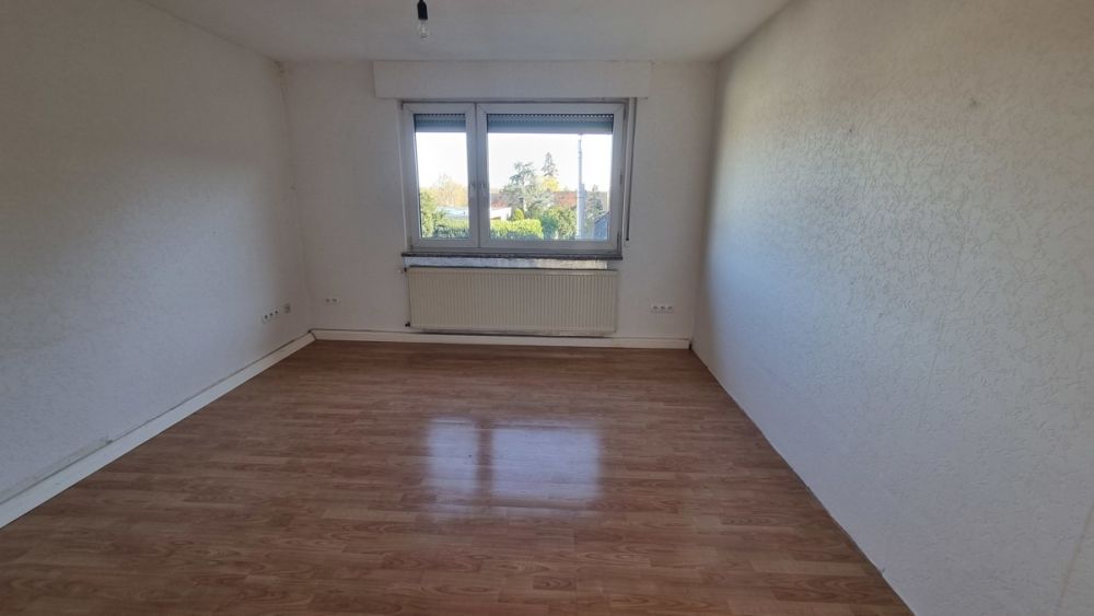 Gutes Mehrfamilienhaus in Rüsselsheim: Attraktive Investitionsmöglichkeit mit Mietpotenzial