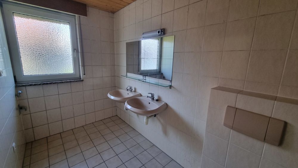 Gutes Mehrfamilienhaus in Rüsselsheim: Attraktive Investitionsmöglichkeit mit Mietpotenzial