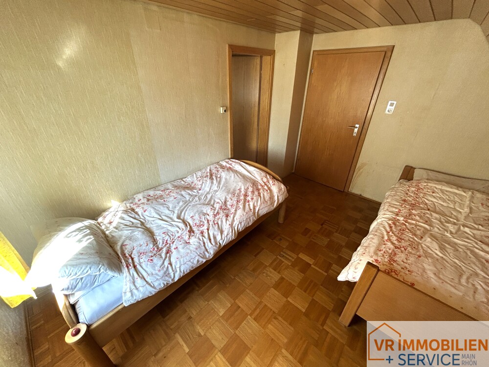 Mehr als nur vier Wände! - Einfamilienhaus mit Nebengebäude, Doppelgarage & Garten in 97618 Wollbach!