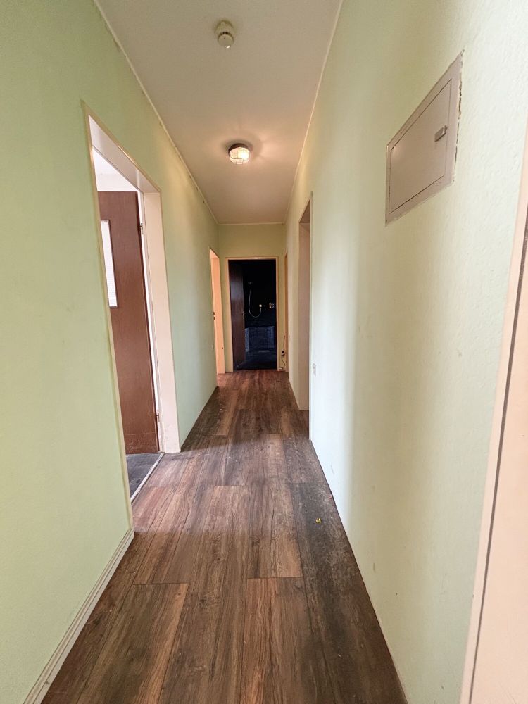 Renovierungsbedürftige Eigentumswohnung mit Garage im Hochpaterre: Ihr neues Zuhause in Ahlen erwartet Sie!