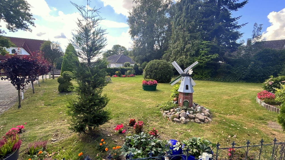 Ein-/Zweifamilienhaus mit großzü. Garten, Garage sowie abtrennbarem Bauplatz in Edewecht-Osterscheps