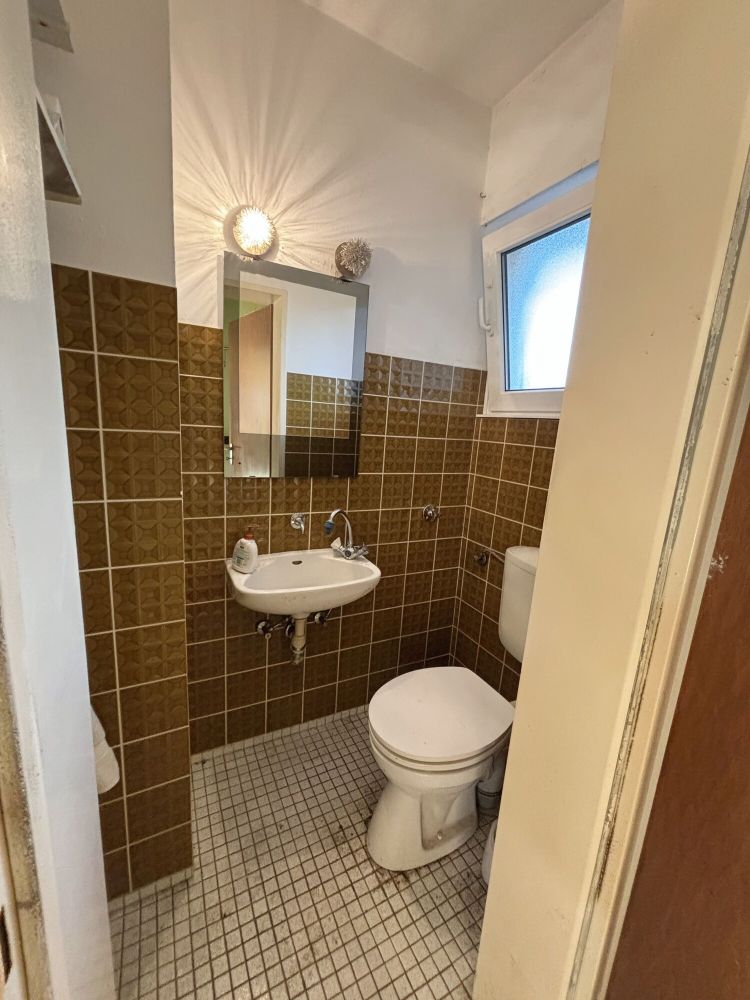 Renovierungsbedürftige Eigentumswohnung mit Garage im Hochpaterre: Ihr neues Zuhause in Ahlen erwartet Sie!