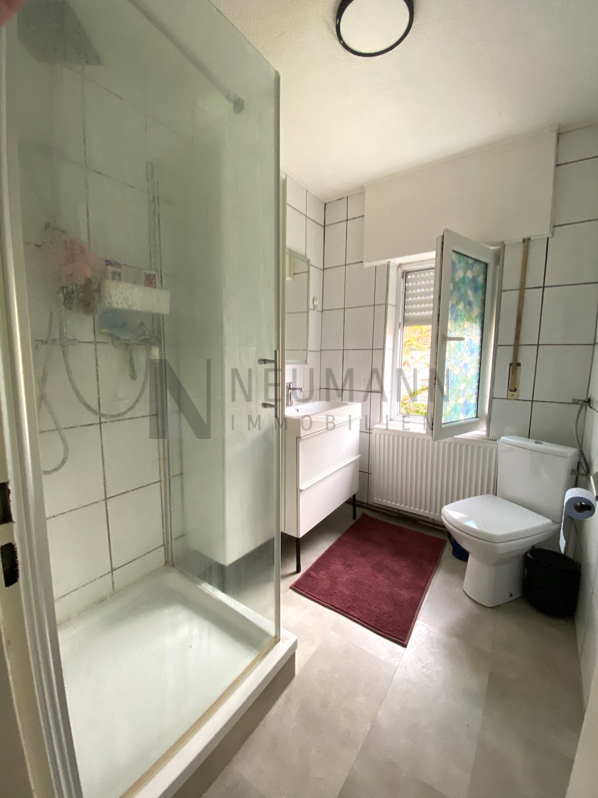 Mehrfamilienhaus mit Gewerbeeinheit (teilvermietet) und großem Garten