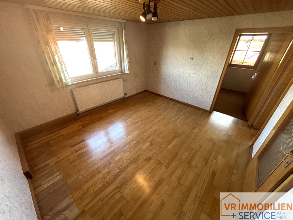 Mehr als nur vier Wände! - Einfamilienhaus mit Nebengebäude, Doppelgarage & Garten in 97618 Wollbach!