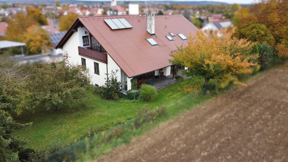 Naturidylle und Baukunst vereint: Stilvolles Wohnen in ruhiger Ortsrandlage