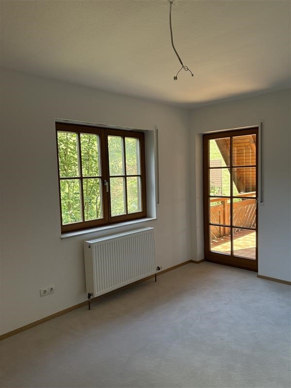 Schlafzimmer mit Balkonzugang