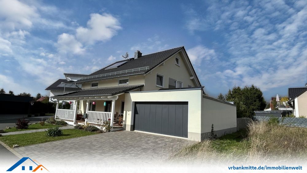 Neuwertiges Einfamilienhaus mit einladender Veranda erwartet Sie als neuen Besitzer!