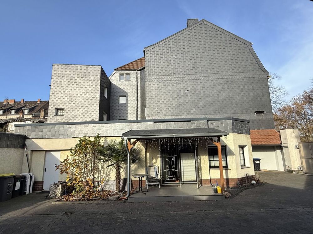 7 Parteienhaus mit schönem Innenhofgarten und Car-Ports in Duisburg Mittelmeiderich