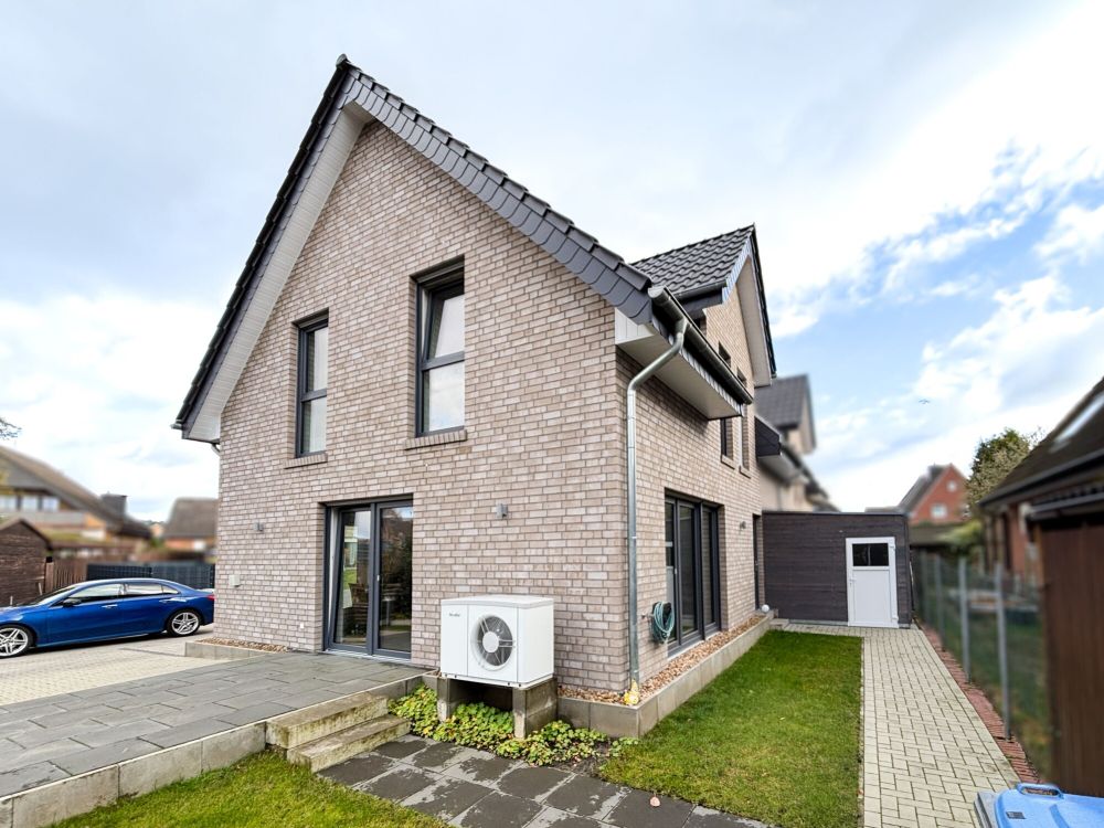 Optimal konzipiert! - Vermietete Neubau-Doppelhaushälfte im Ortskern von Bevergern!