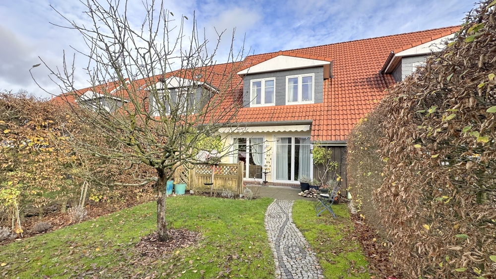 Reihenmittelhaus mit Terrasse und Carportstellplatz in Bad Zwischenahn