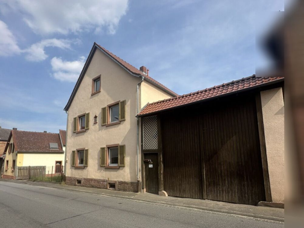 Charmantes renovierungsbedürftiges Einfamilienhaus mit großem Grundstück und vielseitiger Scheune