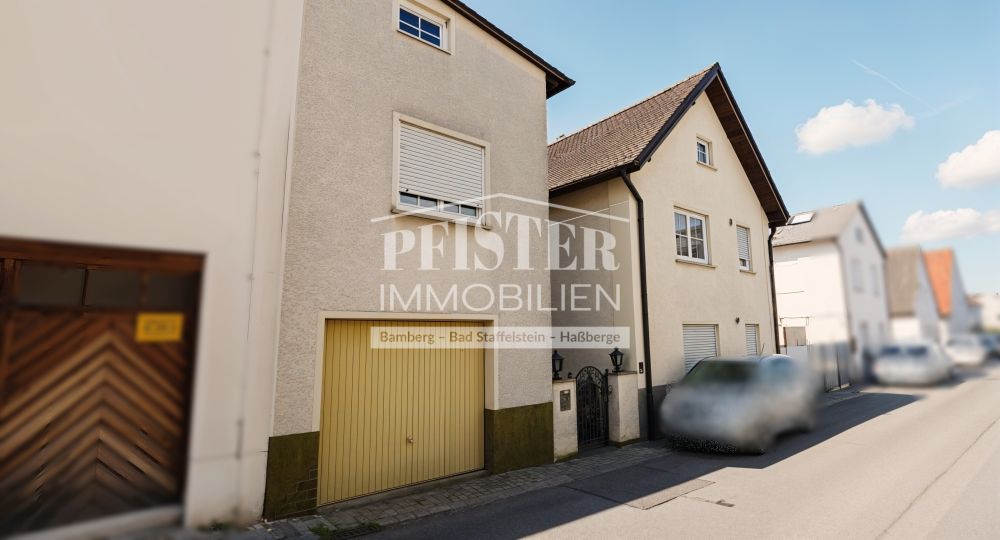 Zweifamilienhaus + Einliegerwohnung in zentraler Lage von Hallstadt