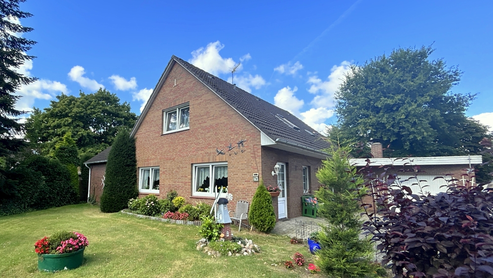 Ein-/Zweifamilienhaus mit großzü. Garten, Garage sowie abtrennbarem Bauplatz in Edewecht-Osterscheps