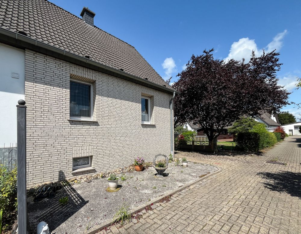 Doppelhaushälfte mit Charme, Potenzial und großem Garten in Lengerich (2)