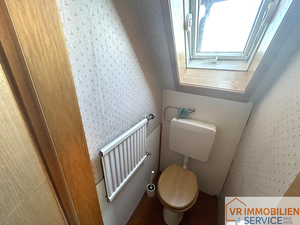 Mehr als nur vier Wände! - Einfamilienhaus mit Nebengebäude, Doppelgarage & Garten in 97618 Wollbach!