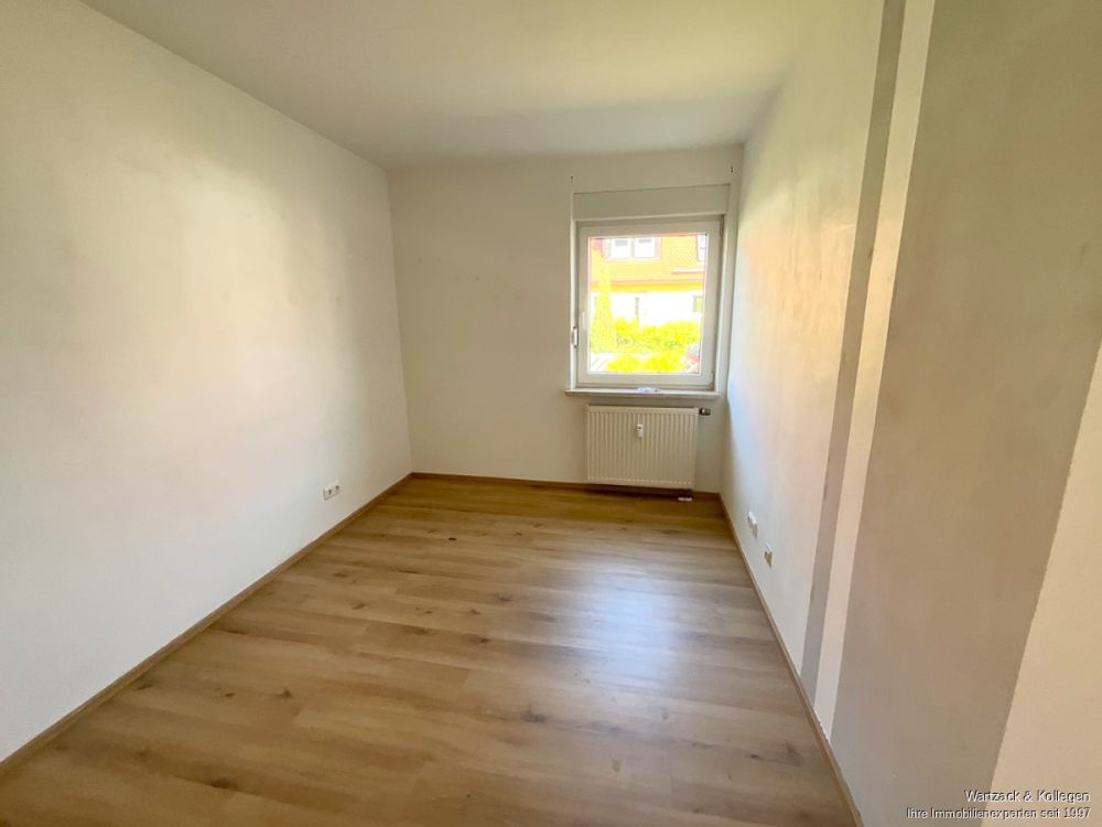 Interessante Kapitalanlage - Doppelhaus mit 2 Wohnungen und einer Doppelhaushälfte in Büchenbach