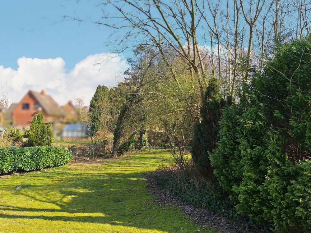 Zauberhaftes Holzbohlenhaus mit Einliegerwohnung in Mohrkirch