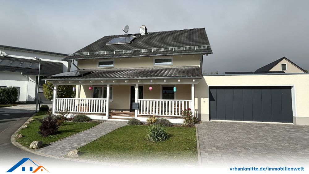 Neuwertiges Einfamilienhaus mit einladender Veranda erwartet Sie als neuen Besitzer!