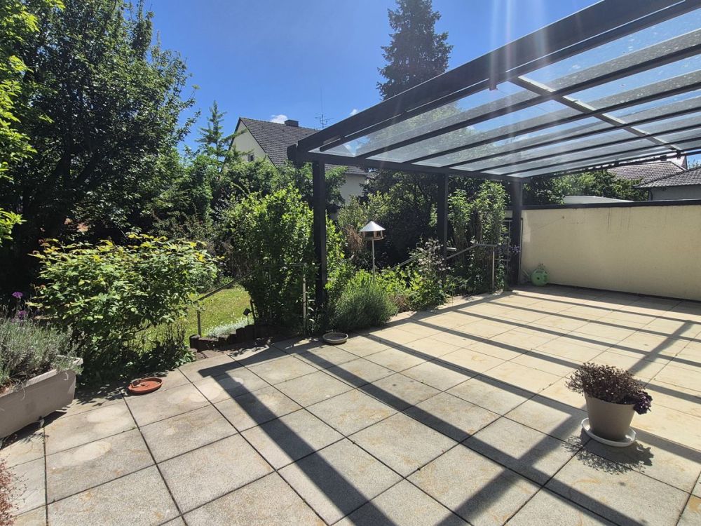 Kapitalanlage trifft Wohnkomfort – Dreifamilienhaus mit Traumgarten in Bad Vilbel-Dortelweil