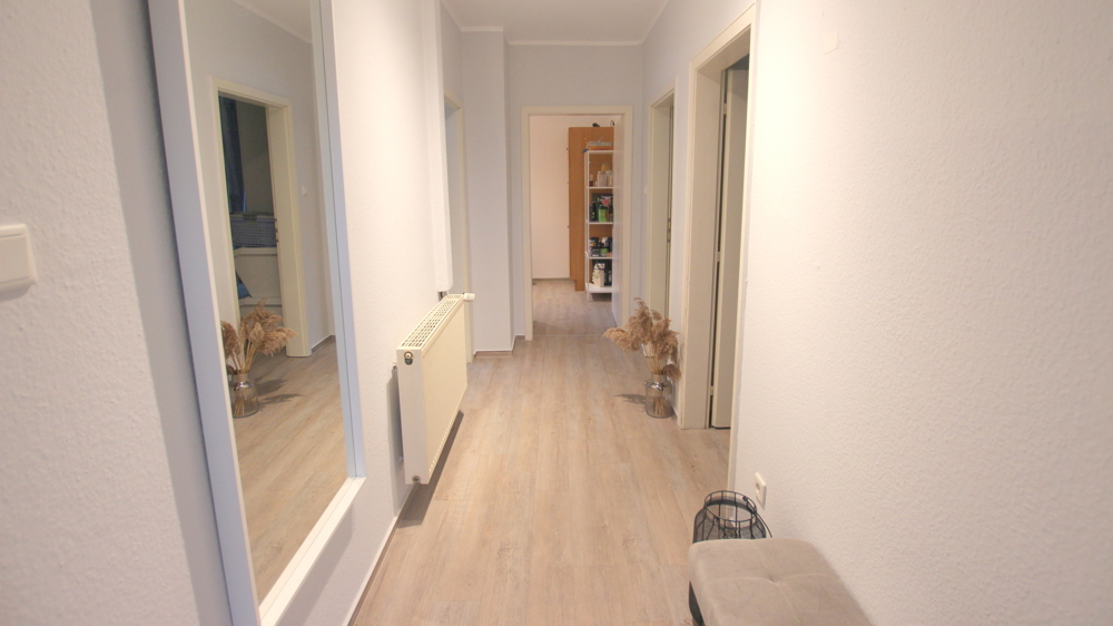 Attraktive 3-Zimmer-Obergeschosswohnung in einem Zweifamilienhaus auf eingegrüntem Grundstück