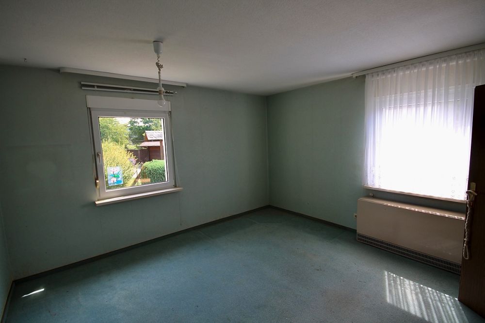 Idyllische Mainlage: Doppelhaushälfte mit Erholungsgrundstück in erster Reihe