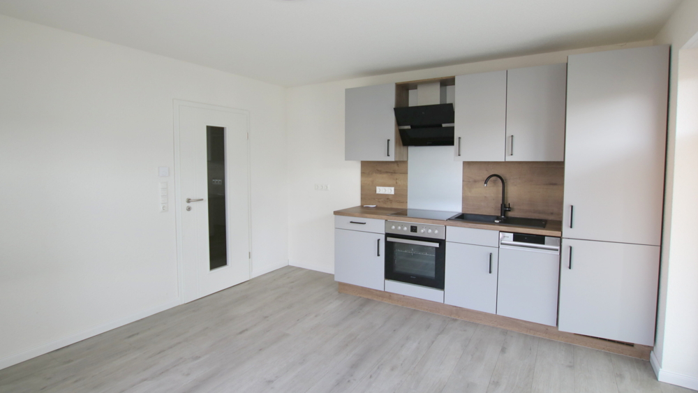 Neuwertige Erdgeschosswohnung mit Terrasse und Pkw-Stellplatz in Westerstede – zentrale Wohnlage