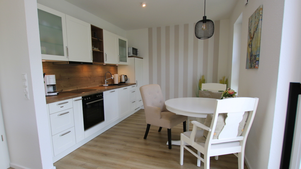 Absolut neuwertige OG-Wohnung (KfW-55) mit Balkon und weiteren Extras in ruhiger Lage von Bad Zw'ahn