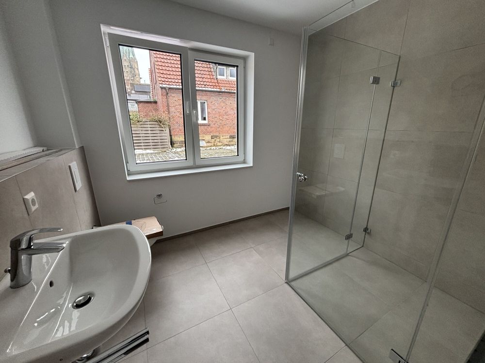 Mit Garten und 2 Stellplätzen!
hochwertige 3-Zimmer Mietwohnung
in zentraler Lage von Rheine! (4)