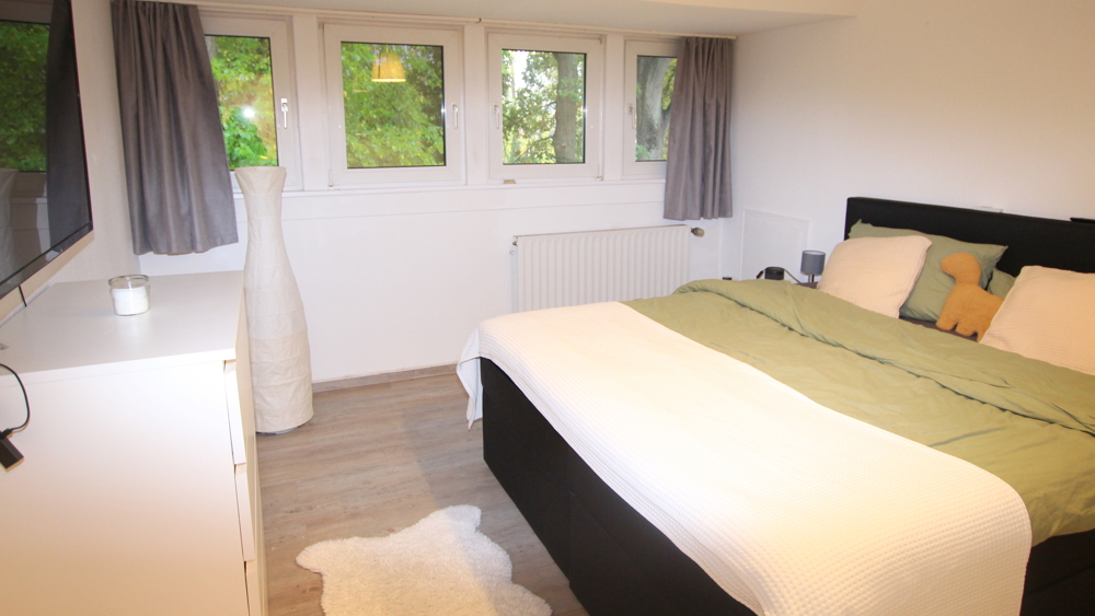 Attraktive 3-Zimmer-Obergeschosswohnung in einem Zweifamilienhaus auf eingegrüntem Grundstück