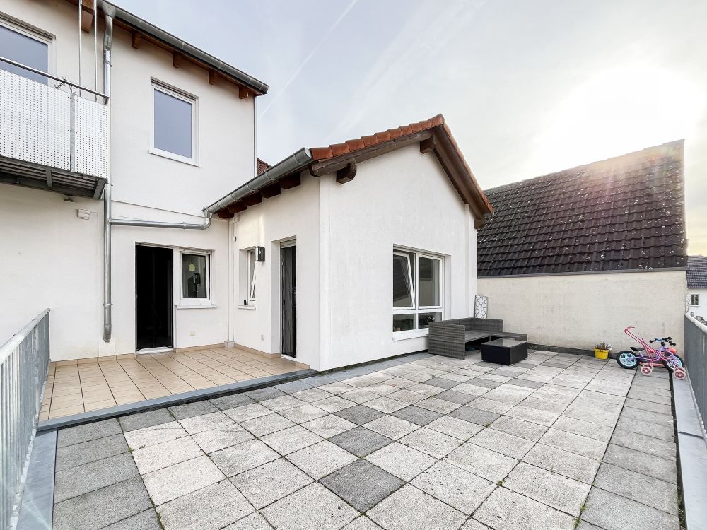 Kapitalanlage mit Entwicklungspotenzial – zwei gepflegte Häuser im Stadtkern von Erlenbach am Main