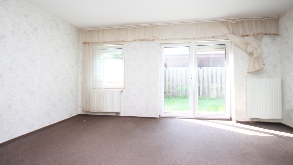 Kapitalanlage! Solide Doppelhaushälfte mit PV-Anlage, Garage und großem Gartenbereich in Friesoythe