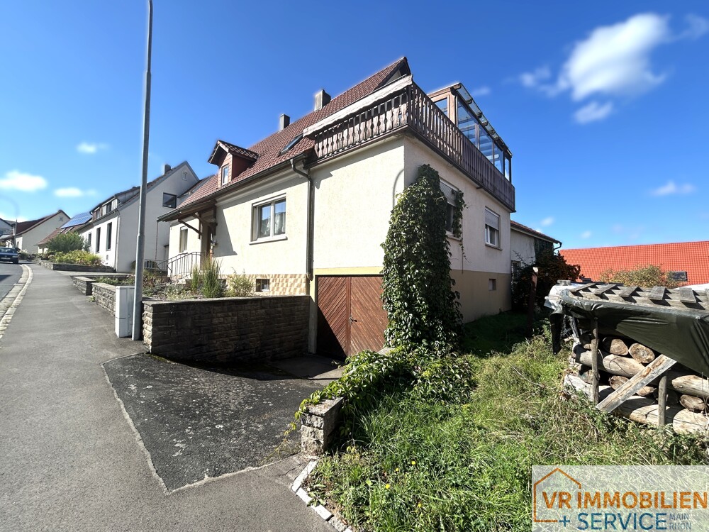 Mehr als nur vier Wände! - Einfamilienhaus mit Nebengebäude, Doppelgarage & Garten in 97618 Wollbach!