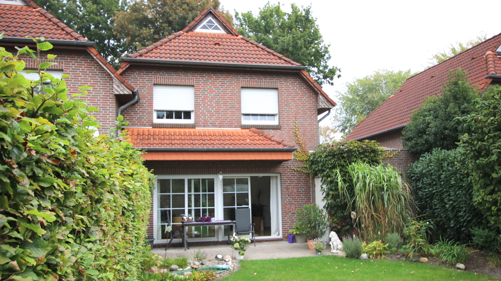 Kapitalanlage! Reihenendhaus m. Garage, Terrasse u. sonnigem Garten in Edewecht / ruh., zentr. Lage