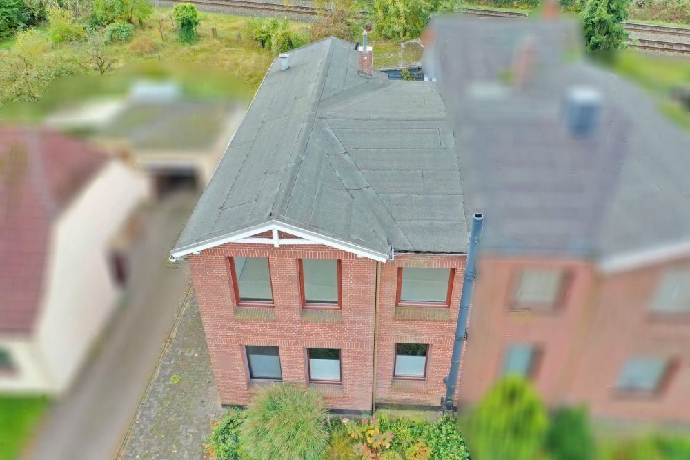 Ein Zuhause mit Potenzial – gemütliche Doppelhaushälfte mit Wintergarten, Carport und Gewächshaus