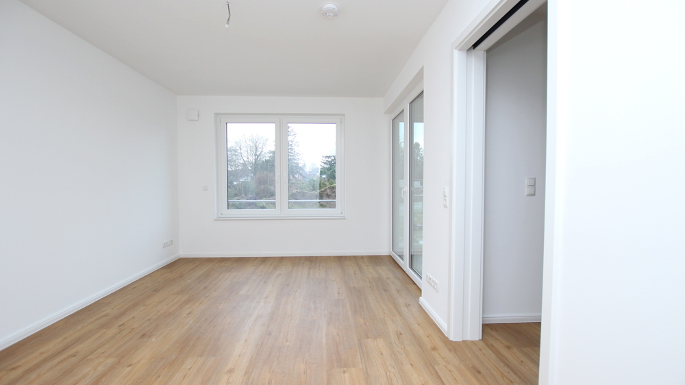 Stilvolle 3-Zimmer-Neubau-Wohnung im OG mit Wintergarten in zentraler Lage von Varel nahe Dangast